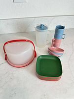 All items grouped: cake carrier, pitcher, mugs, bowls, stacked plates