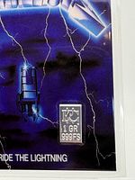 Close-up of silver bar details on the card