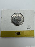 Reverse of 1913/8 Canadian dime in 2×2 holder showing denomination and date