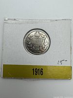 Reverse of 1916 Canadian 10-cent coin in cardboard holder