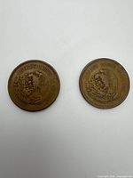 Reverse sides displaying smaller eagle coat of arms