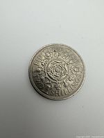Reverse side of 1967 two shillings coin showing Tudor rose design and date