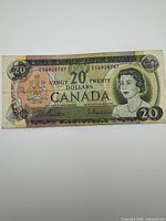Front of the 1969 $20 Bank of Canada note showing serial number and portrait