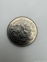 Reverse side showing prairie crocus, legends and denomination