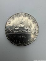 Reverse of 1976 Canadian one-dollar Voyageur coin