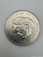 Obverse of 1981 UK 25 New Pence crown featuring conjoined busts of Prince Charles and Lady Diana