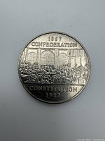 Reverse side of 1982 Canadian nickel dollar showing commemorative design and legends