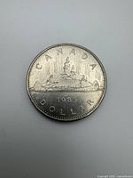 Reverse side of 1985 Canadian Voyageur dollar coin
