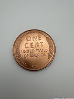 Reverse side of copper round with wheat cent design