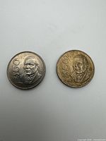 Obverse of both 1987 Mexican $50 peso coins, showing portrait, denomination and date