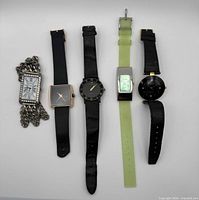 Front view of all five watches laid out side by side