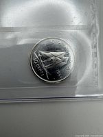 Reverse of 1964 Canadian dime in sealed holder