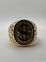 Front view showing dollar sign design and overall style