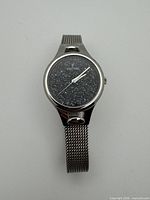 Front view of Festina wristwatch showing crystal-set dial and mesh band