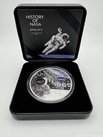 Coin in presentation case with History of NASA lid insert