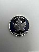 Obverse showing maple leaf design and inscriptions