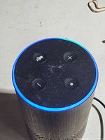 Top view showing control buttons and illuminated blue LED ring