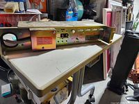 Oblique view of Digital 874-A power controller showing connectors and enclosure