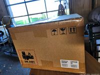 Sealed ADT Smart Home Hub carton, exterior view with UN3481 label