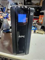 Front view showing APC logo, LCD display reading 118 V, Back-UPS Pro 1500 label