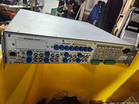 Rear view showing inputs, outputs, network port, power inlet