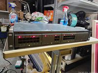 Front view showing Avaya IP Office 500 V2 with two interface cards and status LEDs