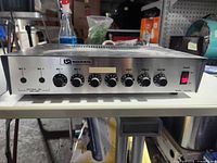 Front view showing brand, control knobs and power switch