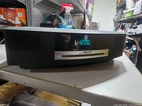 Front view displaying clock and CD slot