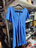 Front view of blue fit-and-flare dress on hanger