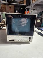 Front view showing CRT screen, control buttons and Eaton branding
