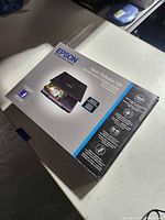 Retail box top showing Epson Perfection V39 branding and feature icons