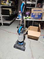 Full view of Eureka MaxSwivel upright vacuum cleaner on floor