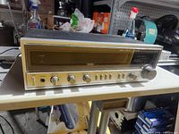 Front view of Fisher AM/FM stereo receiver showing dial and controls