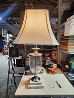 Full view of lamp with shade on table