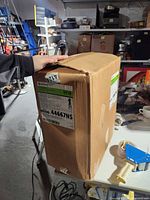 Exterior of opened shipping box with Halyard label