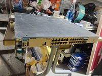 Front of HP switch showing 24 RJ-45 ports and HP branding