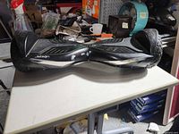 Top view of black Jetson hoverboard on table