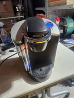 Front angled view of Keurig brewer on table