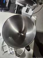 Interior view of stainless steel bowl mounted on mixer