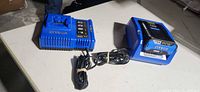 Both Kobalt chargers with battery seated in one unit
