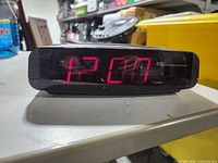 Front view showing red LED time display