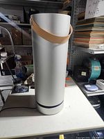 Full view of Molekule Air purifier standing on table