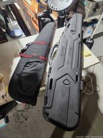 Top view of both gun cases on table