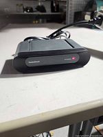 Front view showing RadioShack branding and power indicator