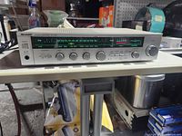 Front view of Sharp SA-250 stereo receiver on table