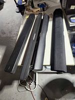 Four soundbars on table
