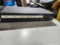 Front view showing SPS-6 label, six zone buttons and brand logo