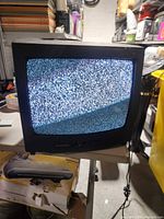 Front view powered on showing static on screen