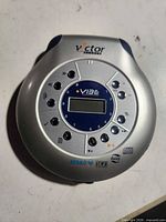 Top view showing Victor branding, VIBE logo, control buttons, LCD
