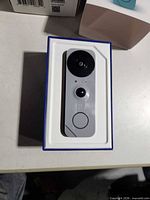 Video doorbell in box (not part of lot)